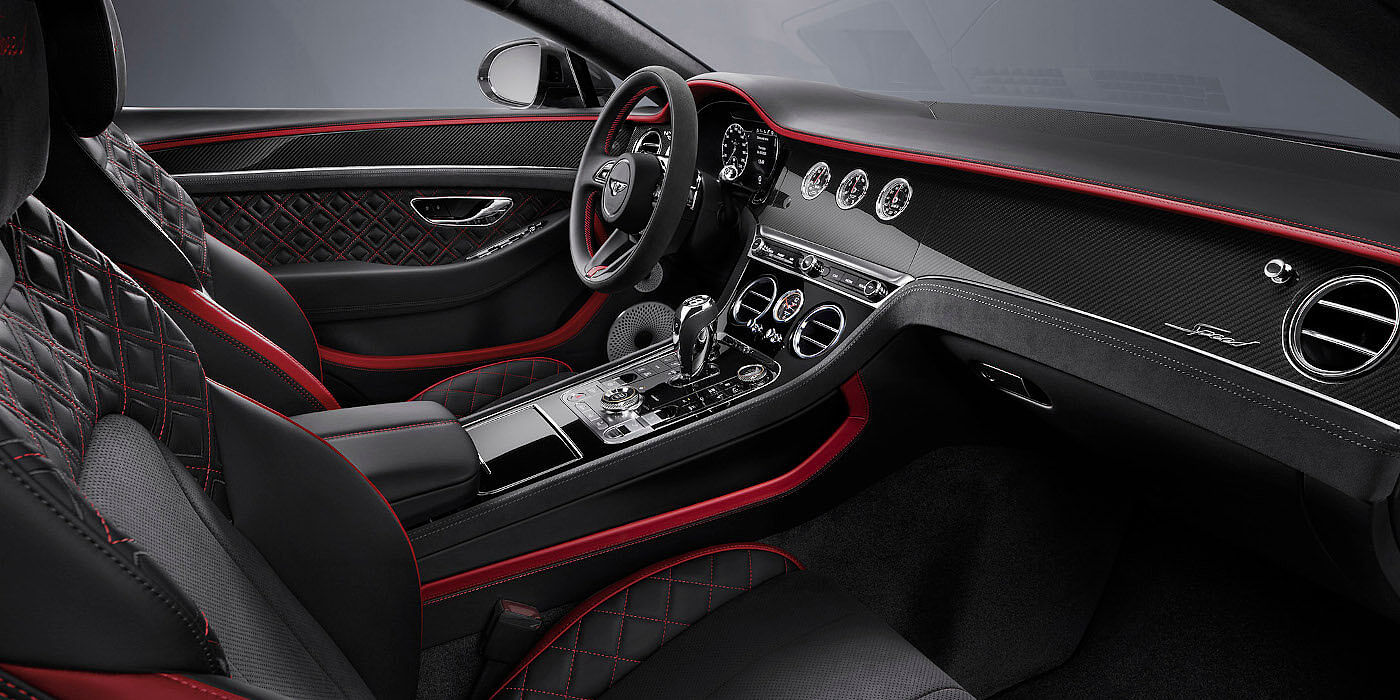 Bentley Riga Bentley Continental GT Speed coupe front interior in Beluga black and Hotspur red hide