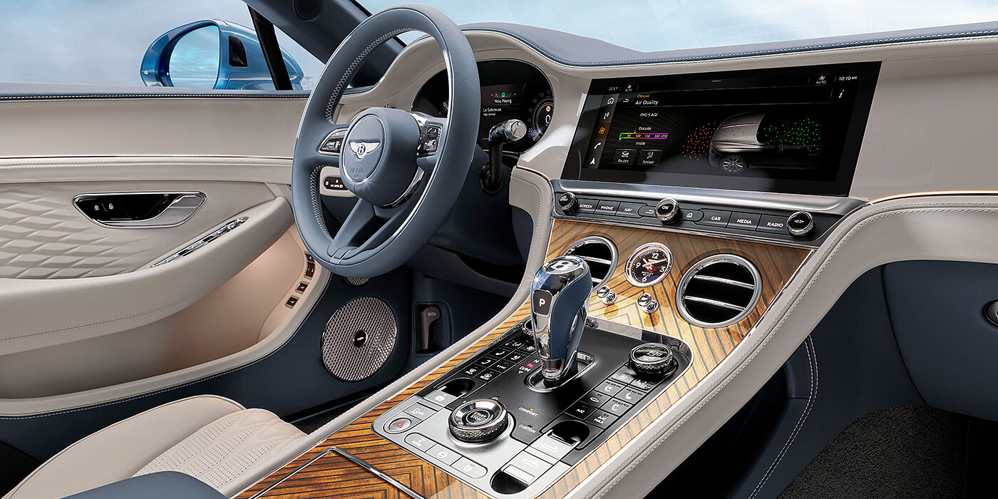 Bentley Riga New Bentley Continental GTC Azure convertible interior front cabin view with Linen and Brunel hides and Piano Linen by Mulliner veneer featuring centre console and centre MMI screen