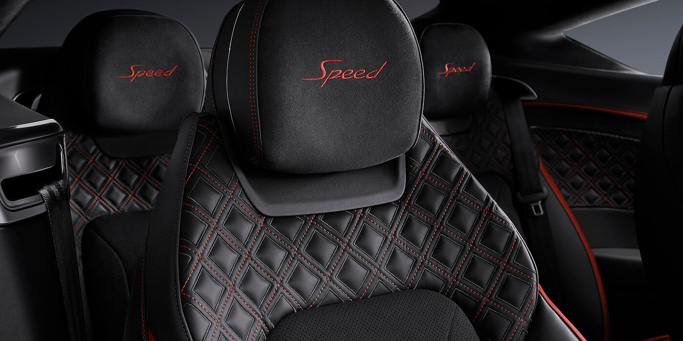 Bentley Riga Bentley Continental GT Speed coupe seat close up in Beluga black and Hotspur red hide