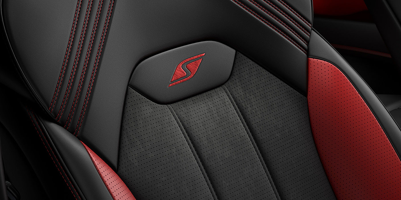 Bentley Riga Bentley Bentayga S seat with detailed red Hotspur stitching and black Beluga coloured hide. 