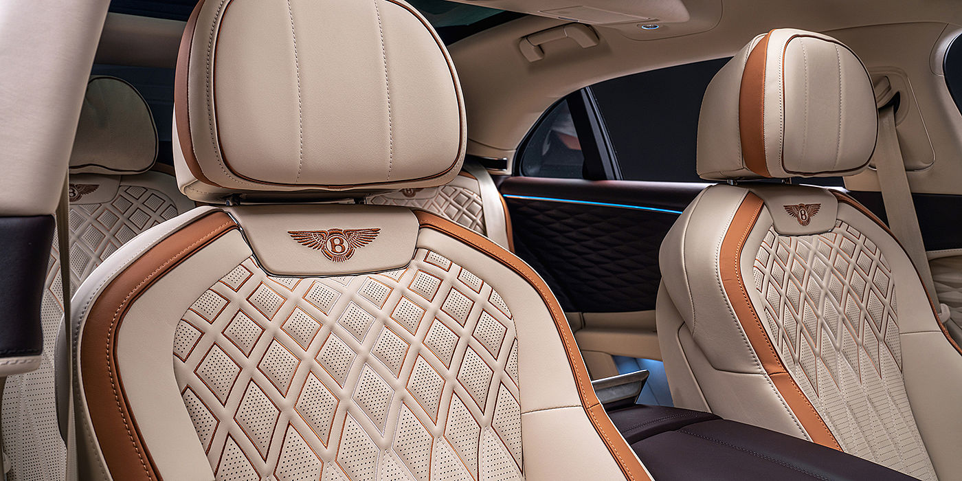 Bentley Riga Bentley Flying Spur Odyssean sedan rear seat detail with Diamond quilting and Linen and Burnt Oak hides