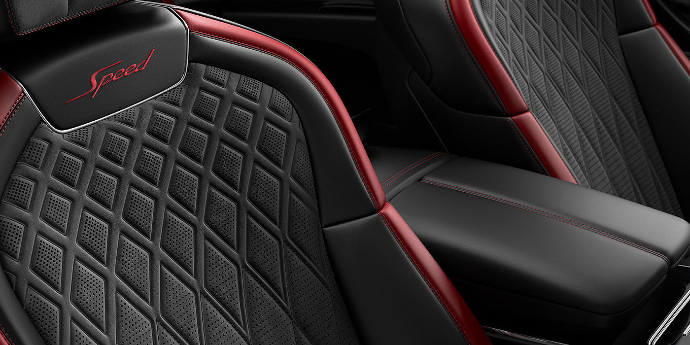 Bentley Riga Bentley Flying Spur Speed sedan seat stitching detail in Beluga black and Cricket Ball red hide