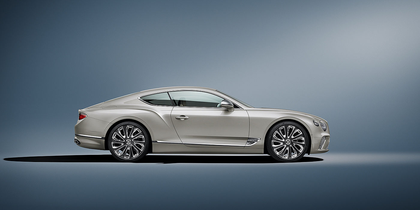 Bentley Riga Bentley Continental GT Mulliner coupe in White Sand paint front 34