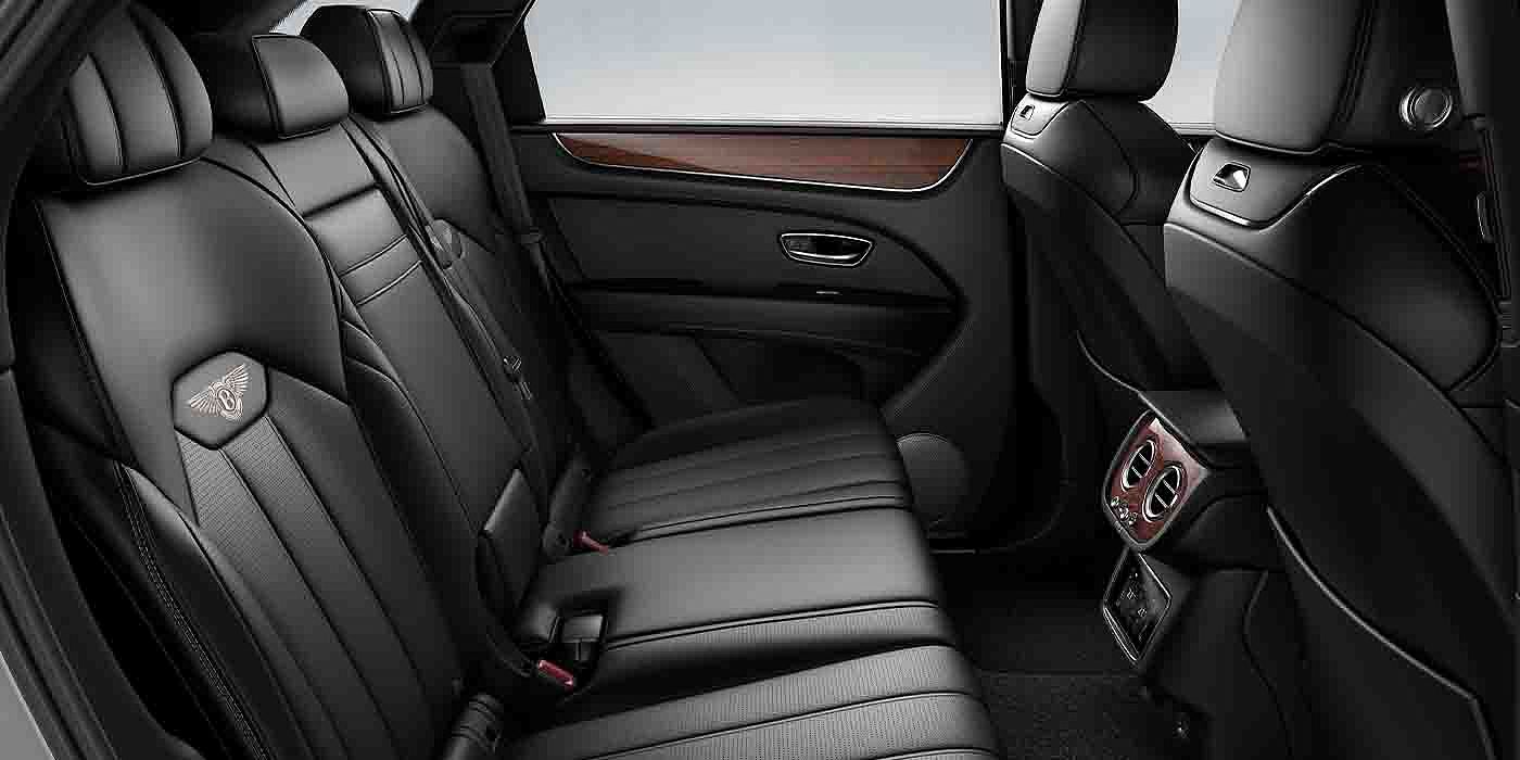 Bentley Riga Bentley Bentayga EWB interior view for rear passengers with Beluga black hide.